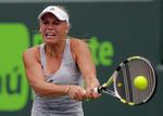 feberfri. Det ser ud til, at Caroline Wozniacki er kommet sig fint efter et par dages feber. Arkivfoto. 