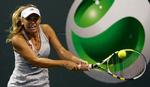 mundfuld. Caroline Wozniacki får en svær opgave, når danskeren skal møde Justine Henin i kvartfinalen. 