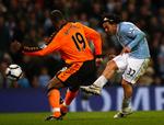 hattrick. Carlos Tevez var forskellen på de to hold, da Manchester City vandt 3-0 over Wigan, som nu ser ud til at få det svært i bunden af Premier League. 