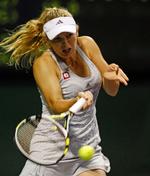 storkamp. Caroline Wozniacki kan komme i menneskehænder mod den lille belgier Justine Henin i kvartfinalen ved Sony Ericsson Open i Miami. 