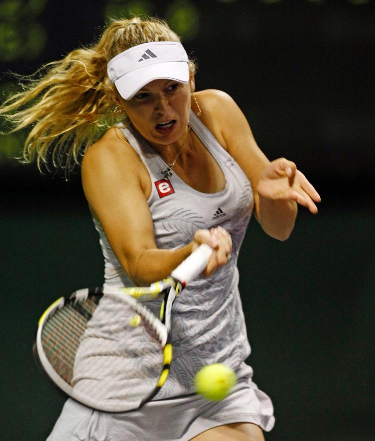 storkamp. Caroline Wozniacki kan komme i menneskehænder mod den lille belgier Justine Henin i kvartfinalen ved Sony Ericsson Open i Miami. 