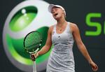ærgerligt. Caroline Wozniacki tabte til den belgiske comeback-komet Justine Henin, som har masser af ros til danskeren. Arkivfoto. 