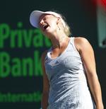 ude. Caroline Wozniacki kan nu koncentrere sig om singleturneringen i Florida, hvor hun er forsvarende mester. Arkivfoto. 