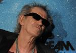 bogorm. Keith Richards to hjem bugner af bøger. 