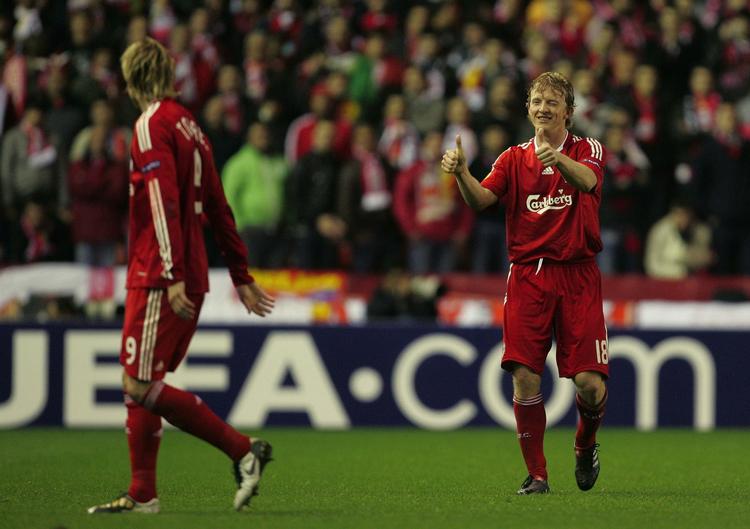 Målscorere. Tre af Liverpools fire mål mod Benfica blev scoret af Fernando Torres (tv.) og Dirk Kuyt. 