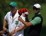 linseoffer. Tiger Woods er en af de mest fotograferede deltagere i US Masters oven på utroskabssagen. 