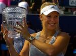 TILFREDS. Caroline Wozniacki har nu vundet syv seniortitler i karrieren. 