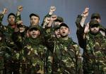 Kamp. Medlemmer af Hizbollah ses her under en mindehøjtidlighed for en dræbt militærleder, Imad Mughniyeh. 