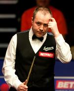 Ups. John Higgins er blevet taget med nallerne i kagekrukken. Arkivfoto. 