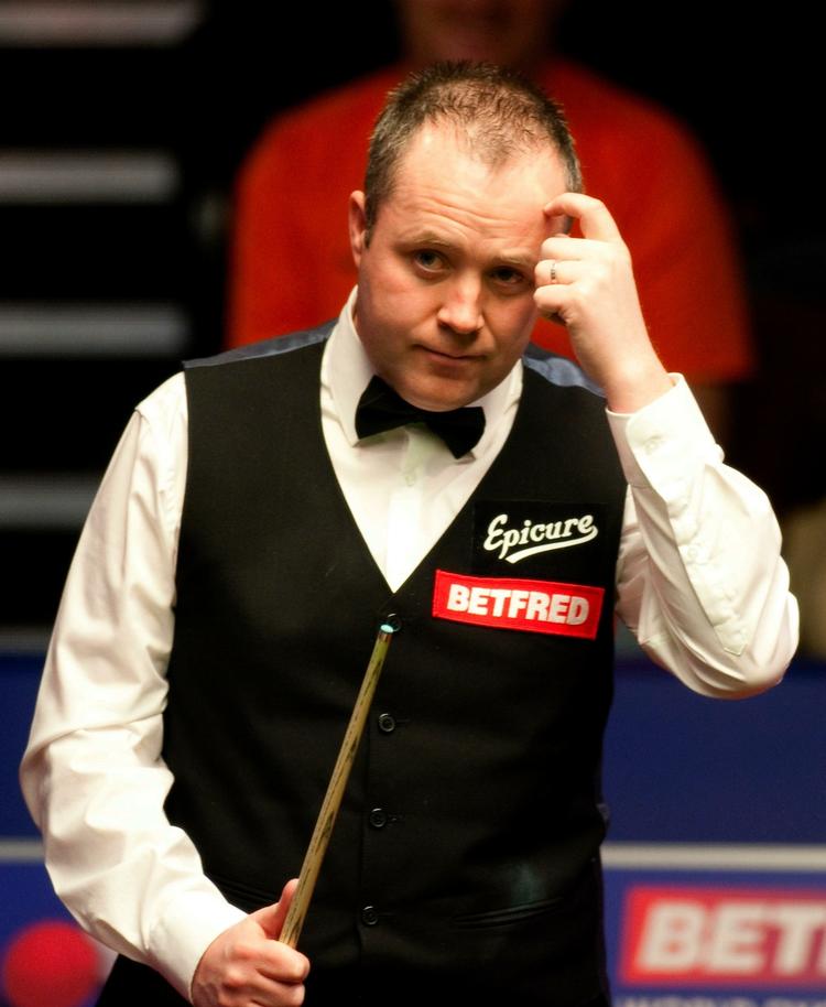 Ups. John Higgins er blevet taget med nallerne i kagekrukken. Arkivfoto. 