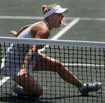 SMERTE. Caroline Wozniacki er ikke tilfreds med, at hun er nødt til at spille tennis i Rom i denne uge. 