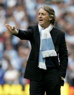 indkøbskurv. Manchester Citys træner Roberto Mancini får ikke problemer med at tiltrække dygtige spillere til klubben, hvis det også handler lidt om gode lønninger. Arkivfoto. 