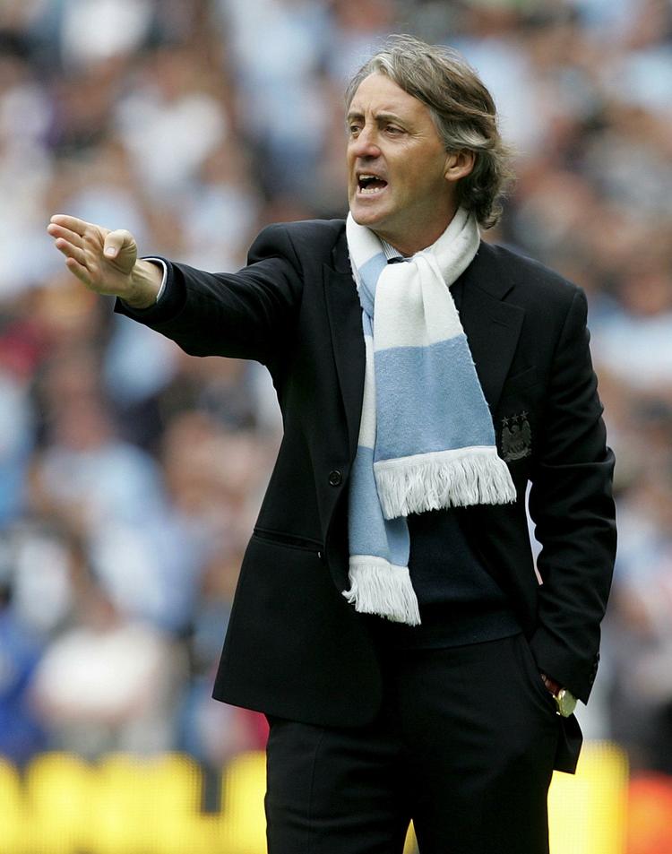 indkøbskurv. Manchester Citys træner Roberto Mancini får ikke problemer med at tiltrække dygtige spillere til klubben, hvis det også handler lidt om gode lønninger. Arkivfoto. 
