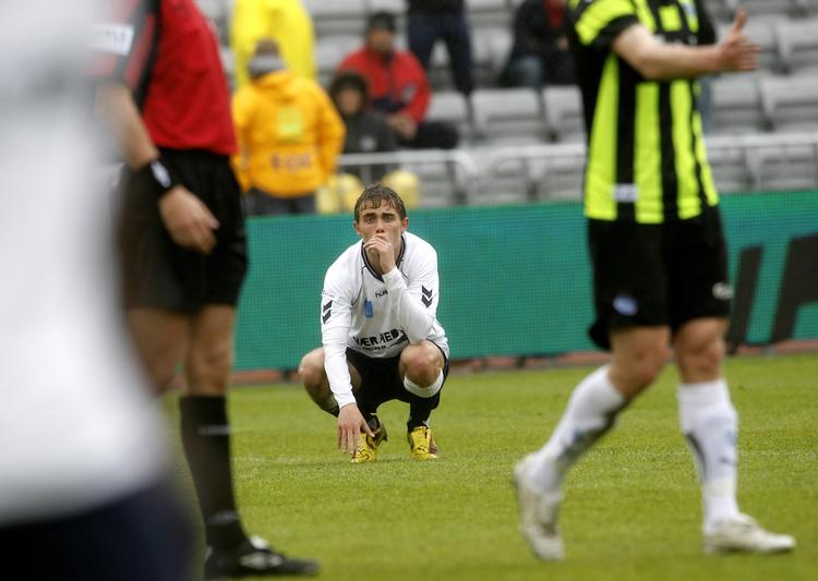 sammenbrud. AGF har en del dspillere med til VM i Sydafrika, men som hold fungerede Århus-holdet ikke i den sidste del af sæsonen. Her ærgrer Jakob Poulsen sig over nedrykningen. Arkivfoto. 