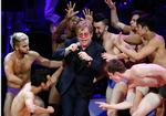 Sir Elton John omgivet af dansere i færd med en version af Madonna's 'Like A Virgin' under en koncert i Carnegie Hall i New York i sidste uge. 