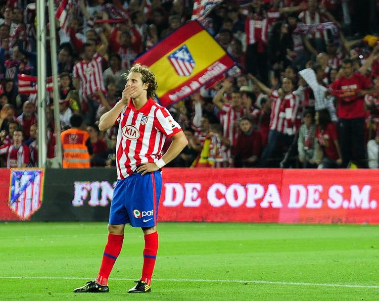 Målløs. Diego Forlan, der for en uge siden scorede to gange i Europa League-finalen mod Fulham, fordøjer 2-0-nederlaget på Camp Nou. 