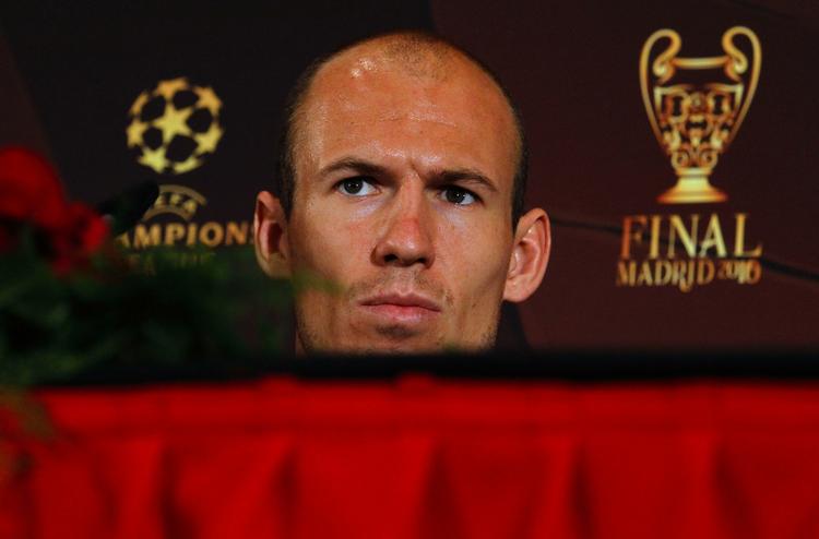 forsonende. Bayern Münchens Arjen Robben takkede på pressemødet i Madrid for nogle gode år i Real Madrid, og forsikrede, at han ikke bærer nag mod klubben, som skilte sig af med ham i 2009. 
