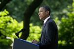 Banktæsk. Bankerne er ikke så tossede med Obamas reform, men nu bliver den en realitet. Her ses Obama præsentere sejren i Det Hvide Hus' Rose Garden. 