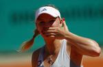 Overskud. Caroline Wozniacki var tydeligvis glad for sejren i Paris. 
