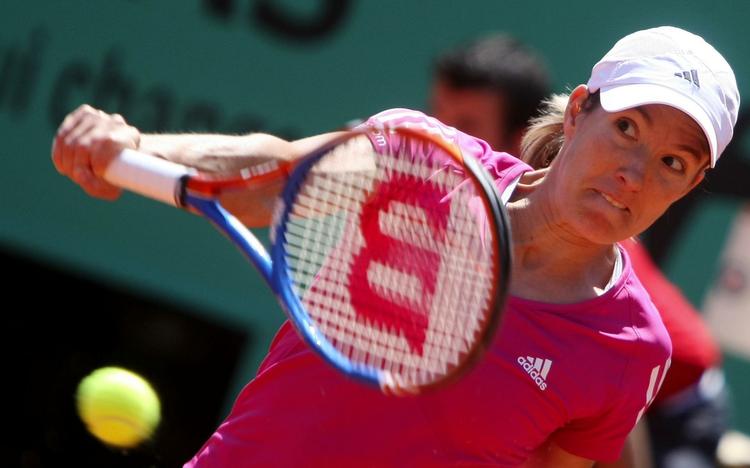 VIDERE. Klara Zakopalova var ikke nogen hindring på Justine Henins vej til tredje runde. 