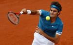 Farvel. Den forsvarende French Open-mester Roger Federer er færdig. 