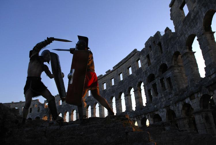Nåde. Gladiator-gravplads antyder nådige henrettelser i de romerske arenaer. 