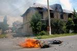 URO. Usbekisk ejendom sat i brand i Jalalabad under stridighederne. 