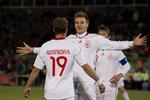 HELTENE. Dennis Rommedahl og Nicklas Bendtner scorede og lagde op til hinanden, da Danmark vandt 2-1 over Cameroun. 