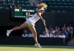 Det er blevet fast tradition, at Caroline Wozniacki stiller op i double ved grandslams. Single som her på billedet er dog fortsat hendes hovedfokus. 