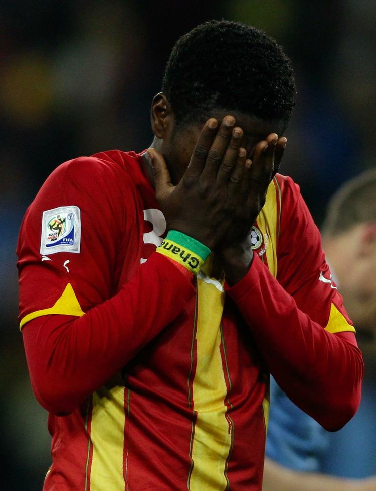 GRÆDEFÆRDIG. Asamoah Gyan var efter kampen svært påvirket af sit brændte straffespark. 