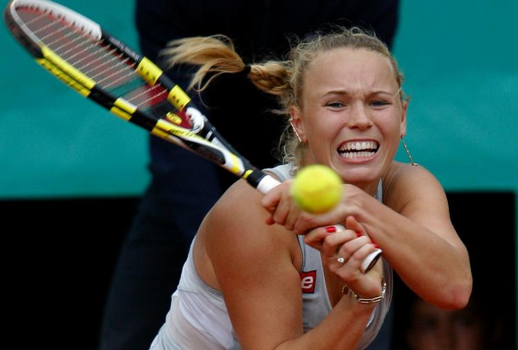 fremgang. Trods det skuffende exit fra Wimbledon rykker Caroline Wozniacki en plads frem på verdensranglisten. Arkivfoto. 