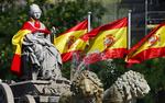 Symbol. Cibeles-statuen ved springvandet i det centrale Madrid har fået flag på. Hvis Spanien vinder VM-finalen eksploderer Plaza de Cibeles  i rødt og gult. 