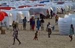 Teltlejre. Hundredtusinder af haitianere må leve i lejre som denne uden for Port au Prince. Men mange af deres hjælpeforsyninger når ikke frem. 