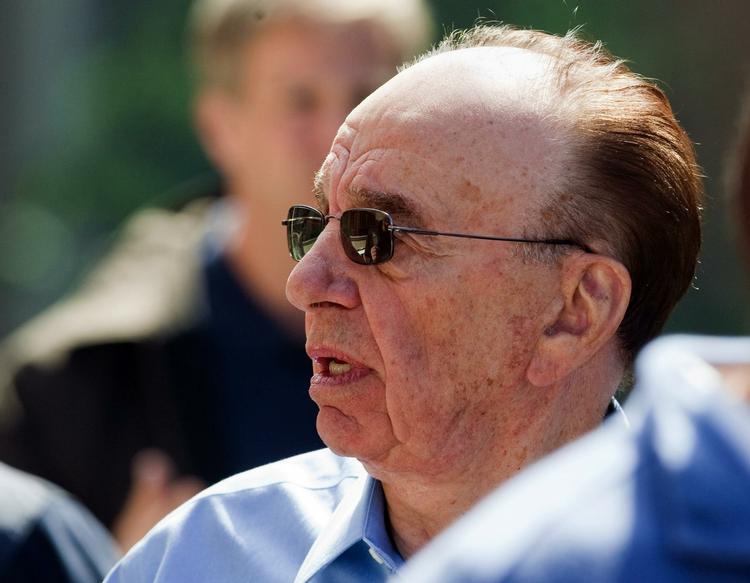 Mediemogul. Ni ud af ti læsere har droppet Rupert Murdoch-avisen The Times på nettet. Til gengæld tjener avisen nu penge på sine netnyheder. Arkivfoto. 