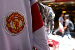 Kontroversiel. Den lille djævel refererer til rødeblusede Manchester Uniteds øgenavn 'The Red Devils'. Arkivfoto. 