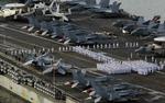 Krigsskib. Især tilstedeværelsen af USS George Washington - et gigantisk, atomdrevet hangarskib- har opildnet nordkoreanerne. 