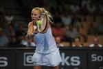 Derudaf. Caroline Wozniacki havde med makkeren Malou Ejdesgaard ingen problemer med at spille sig videre. 