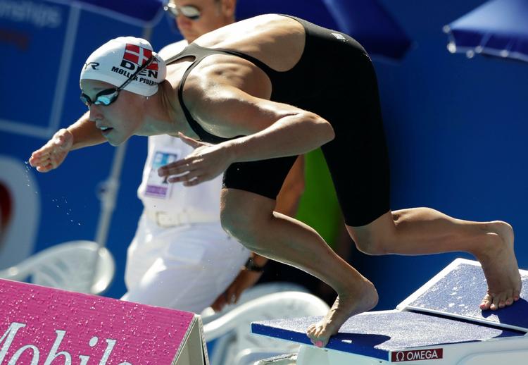 angreb. Rikke Møller Pedersen lægger fra land i det indledende heat i 100 meter brystsvøming, hvor hun fik  hurtigste tid. 