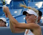Koncentration. 51 minutters offensiv tennis sendte Caroline Wozniacki sikkert videre i Cincinnati. 