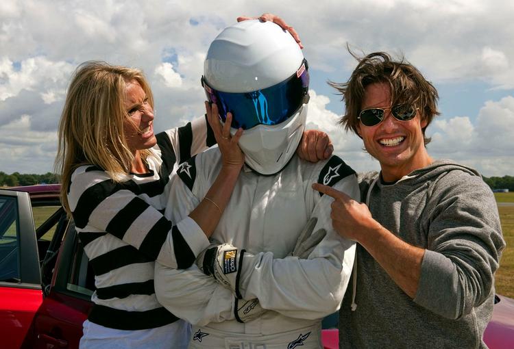MASKEMANDEN. 'The Stig' sammen med de amerikanske skuespiller Cameron Diaz og Tom Cruise. Arkivfoto. 