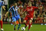 debut. Christian Poulsen optrådte for første gang i Liverpools røde trøje og fik en godkendt debut. 