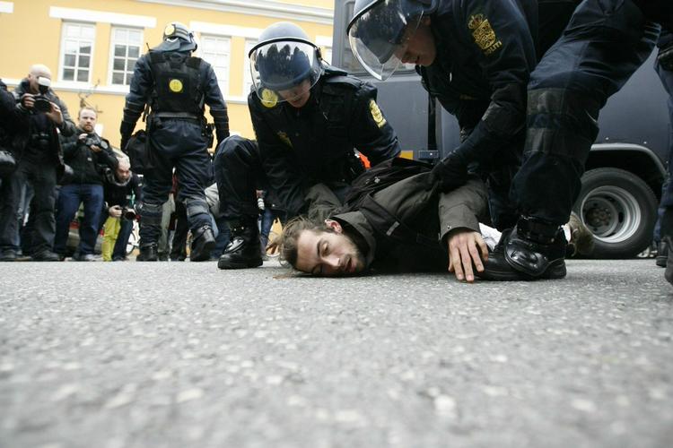 Uberettiget. De historisk mange anholdelser under klimatopmødet var ikke uberettigede, siger kammeradvokaten i byretten i København 