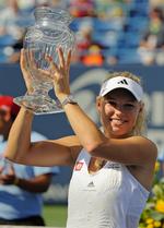 Med sejren over Nadia Petrova i New Haven tog Caroline Wozniacki et skridt nærmere den enorme pengesum, der venter hende, hvis hun vinder US Open. 
