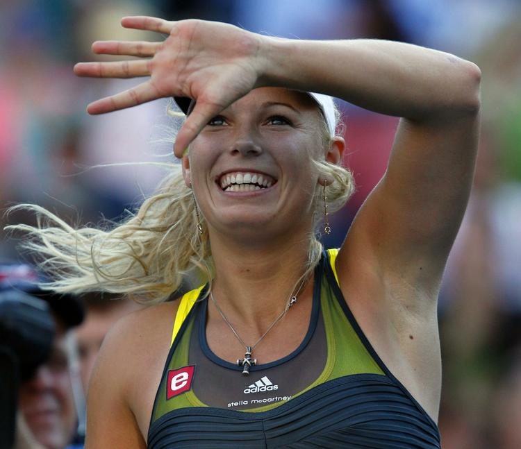 darling. Selv Caroline Wozniackis største kritikere er imponerede over danskerens flotte sejr over Maria Sjarapova. 