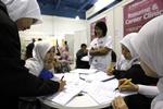 Studieløft. Både Singapore og Malaysia har inden for de seneste ti år investeret voldsomt i uddannelsessektoren, så de kan komme på omgangshøjde med den vidensorienterede globale økonomi. Især Malaysia har her haft et efterslæb. Arkivfoto: Vincent Thian 