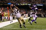 touchdown. New Orleans Saints' Robert Meachem griber en pasning fra Drew Brees og scorer touchdown. 