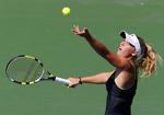 tv-lækker. Caroline Wozniacki og hendes kolleger i kvindetenniseliten kan ifølge filosoffen Thomas Søbirk Petersen være fristet til kirurgiske indgreb, hvis det kan skaffe bedre sponsorkontrakter gennem større interesse fra tv-kanalerne.  Arkivfoto: Paul J. Bereswill/AP 