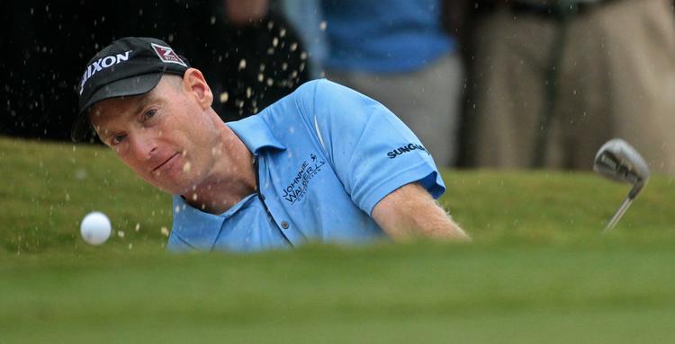 Champ. Jim Furyk røg i bunkeren på 18. hul, men et fantomslag fik ham på titelkurs igen. 