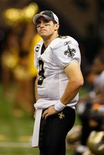 Øv. Saints-quarterback Drew Brees blev intercepted to gange og tabte. 