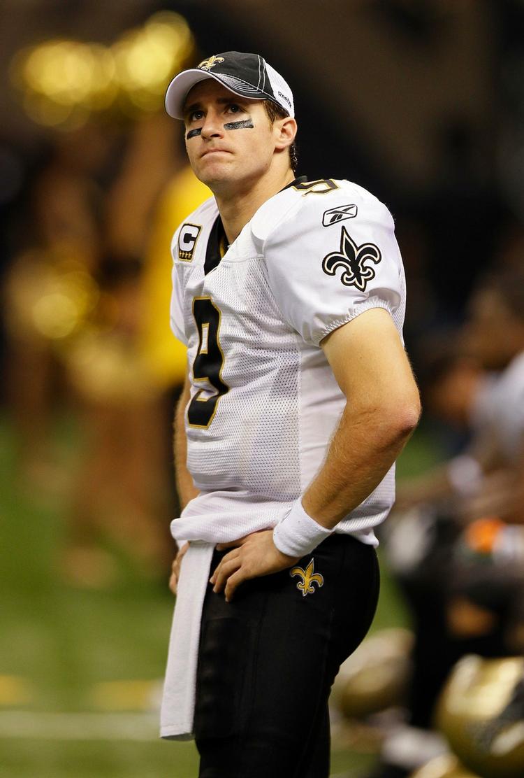 Øv. Saints-quarterback Drew Brees blev intercepted to gange og tabte. 